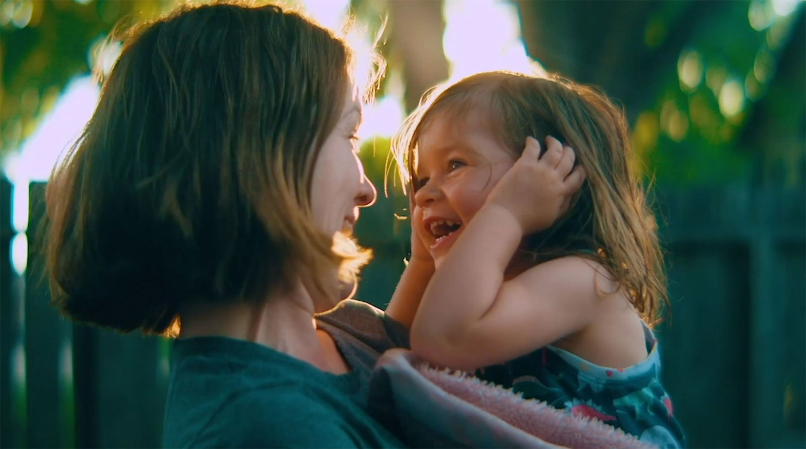 Image of women holding a baby